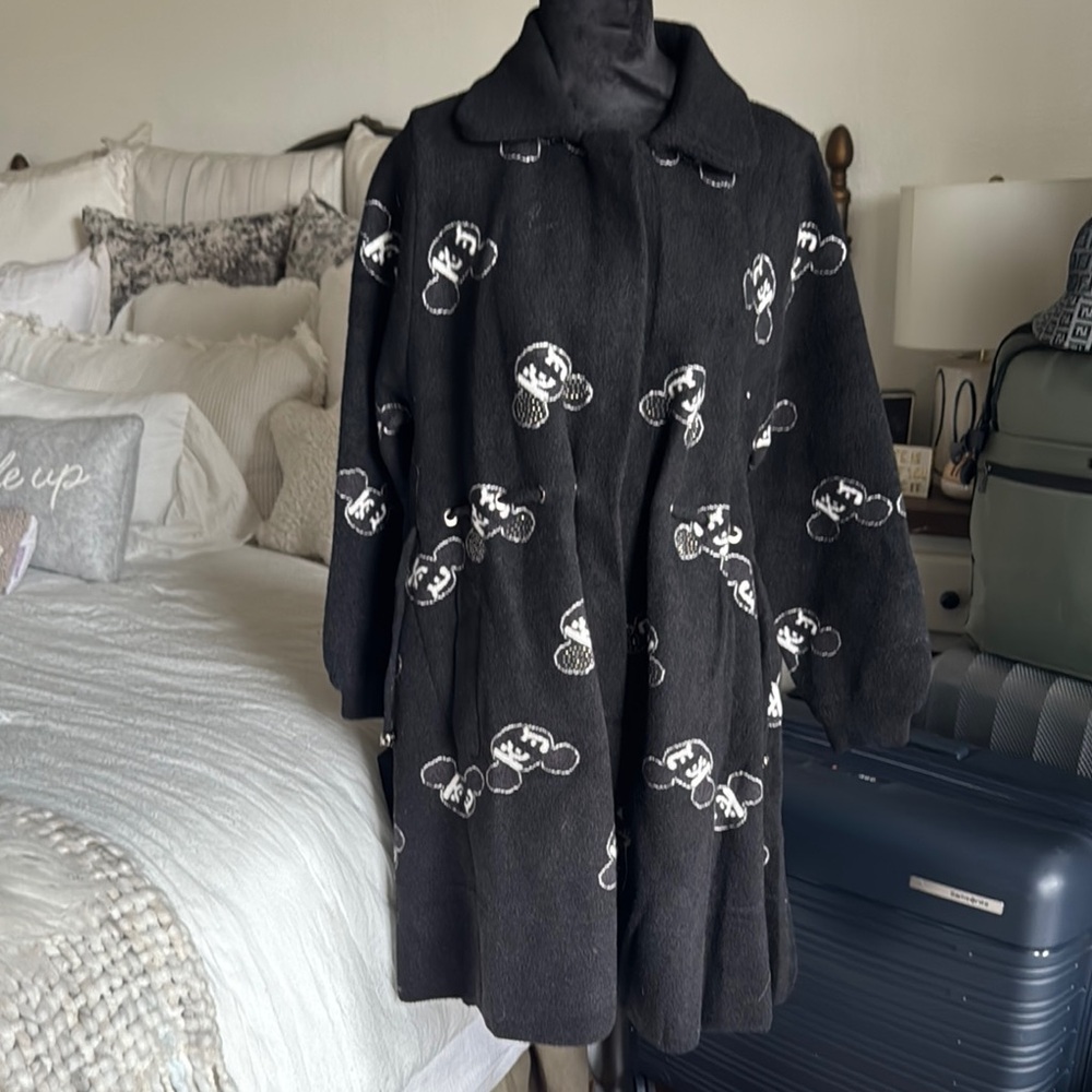 Chic Black Coat with White Floral Design